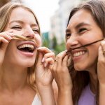 Two girls smiling