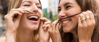 Two girls smiling