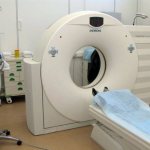 CT scanner and contrast bolus injection system (pictured left)