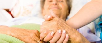 Nurse helping an elderly woman