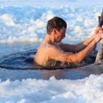 man in the ice hole